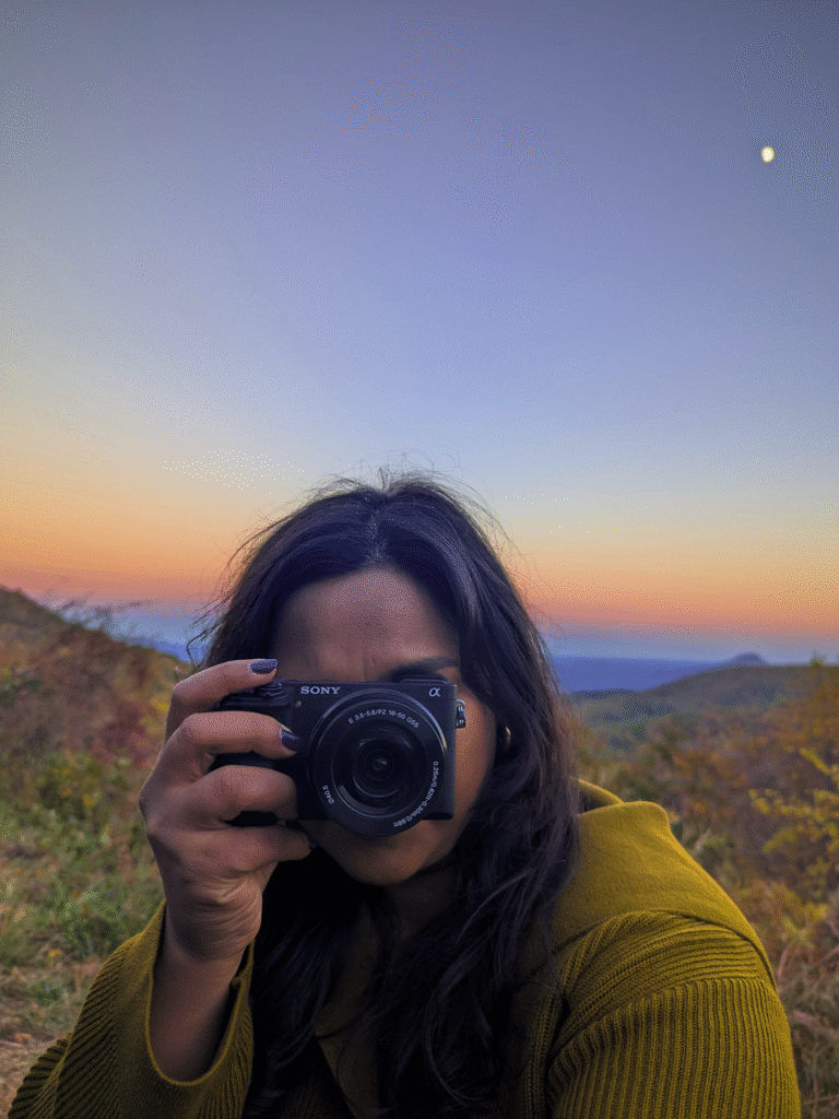 Person Holding Camera